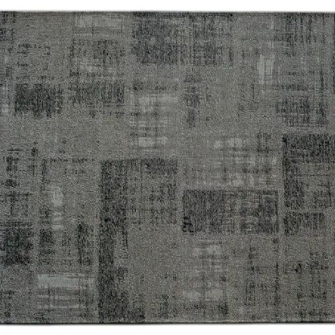 Tappeto Darwin tessuto in cotone e ciniglia a rilievo dall'aspetto slavato e consumatodi Cattelan Italia