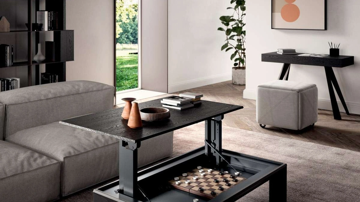 Tavolino multifunzione Metrino in legno e metallo trasformabile a due altezze con vano contenitore sotto il piano di Ozzio