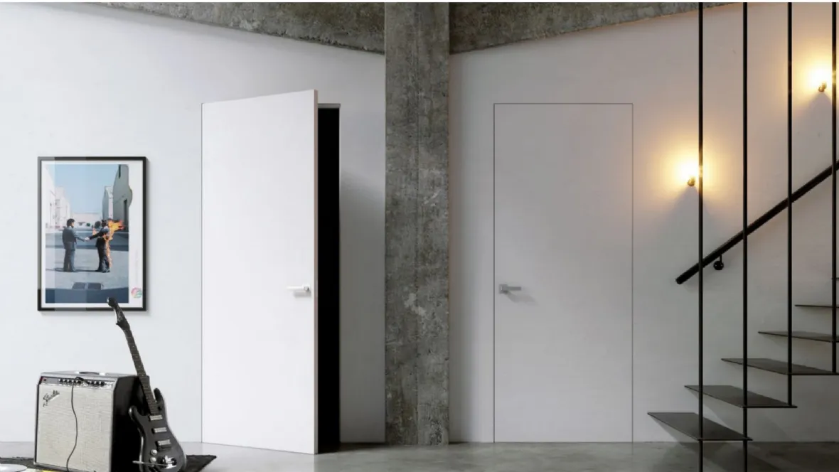 Porta battente per interni in laccato bianco come la parete Gea Filo muro di Doal