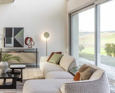 Divano Archibald Sofa System con penisola di Poltrona Frau
