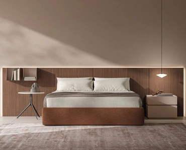 Letto Sommier in tessuto con boiserie in materico Noce cannettato di Tagliabue Mobili