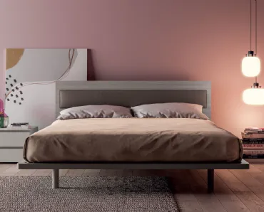 Letto matrimoniale con testiera effetto legno con inserto in ecopelle Olimpia di Tagliabue Mobili