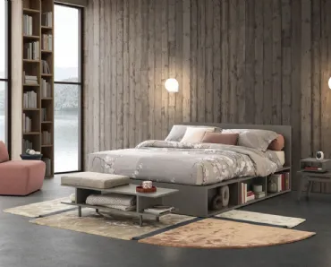 Letto in legno dalle linee essenziali Pongo con testiera e librerie laterali di Oggioni