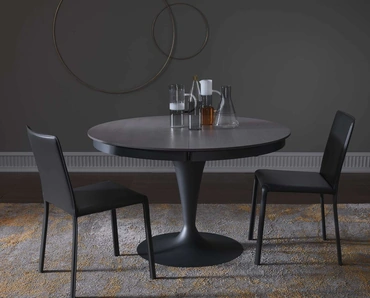 Tavolo rotondo allungabile in Rovere con base in metallo Eclipse Legno di Ozzio