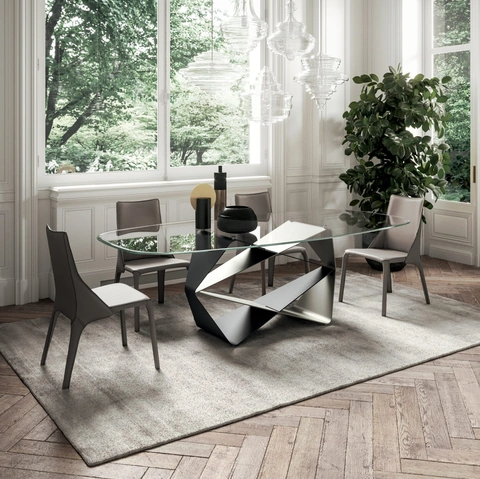 Tavolo scultura con piano in cristallo e base in metallo Gem di Ozzio